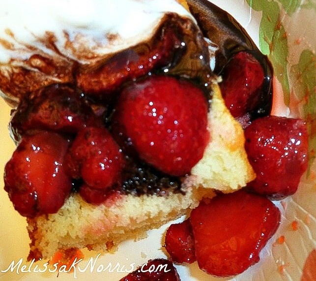 homemade strawberry shortcake recipe strawberries on shortcake in a bowl with ice cream and chocolate sauce