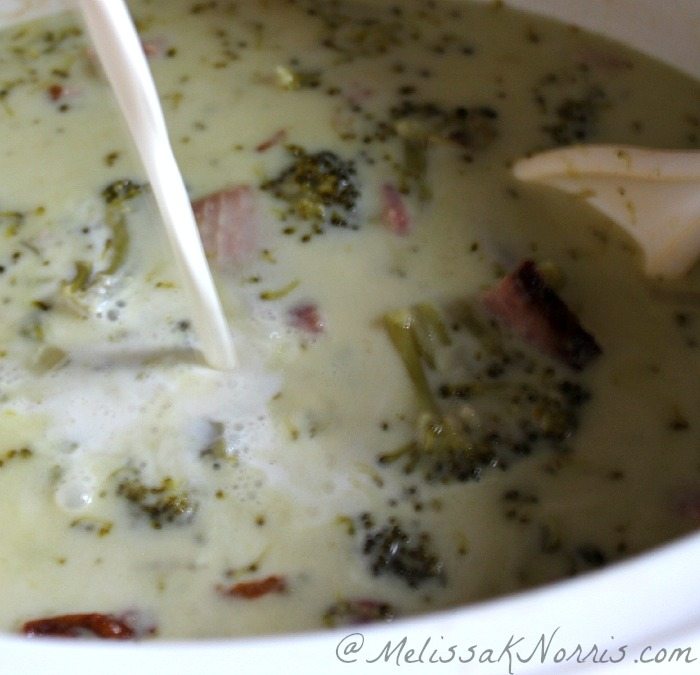 Adding cream to slow cooker cream of broccoli and ham soup from the frugal supper series, gluten free!