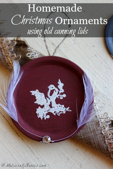 Image of a Christmas ornament with text overlay, "Homemade Christmas Ornament using old canning lids".