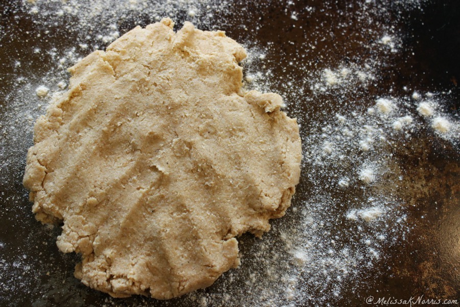 cracker dough ready to roll out on a floured surface