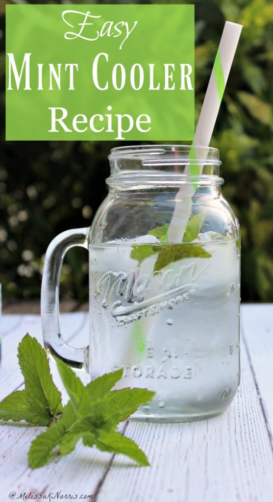 Glass with iced mint cooler and a straw. Text overlay says, "Easy Mint Cooler Recipe".