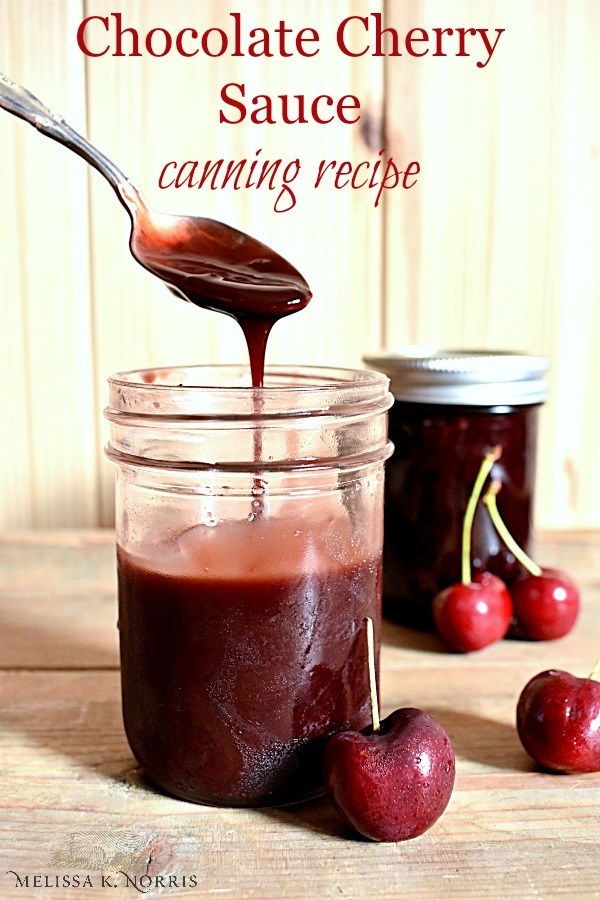 Chocolate cherry sauce canning recipe chocolate cherry preserves in a mason jar on wood table