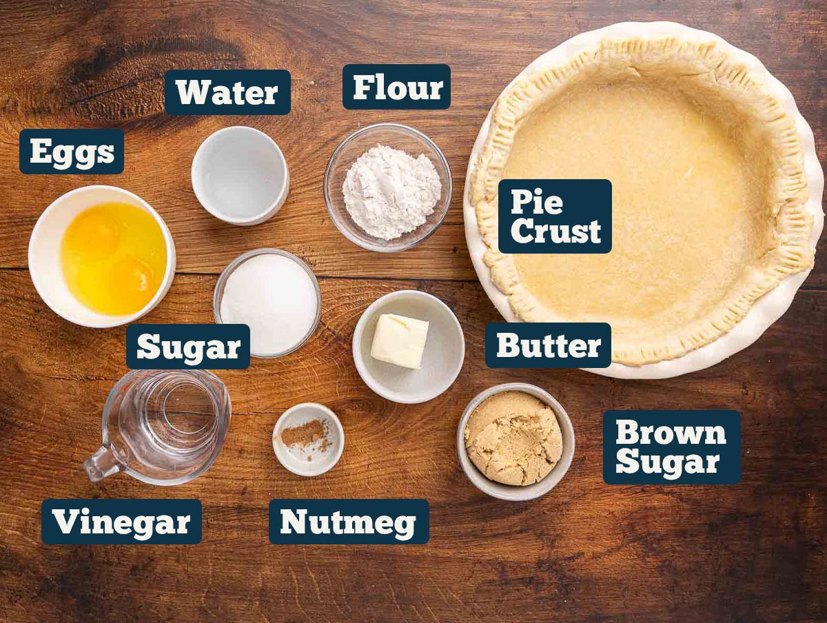 Vinegar pie ingredients: Pie crust, butter, eggs, sugar, flour, nutmeg, vinegar, and water. 