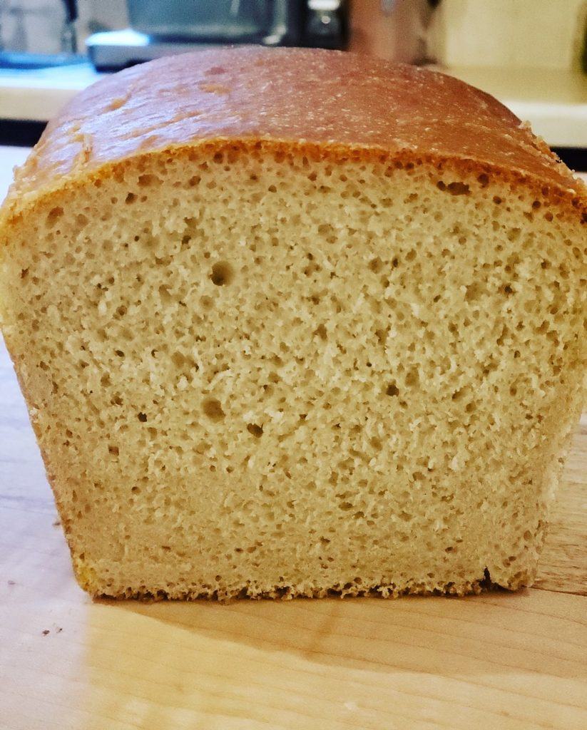 Loaf of sourdough sandwich bread on island