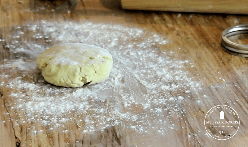 homemade pastry dough on floured counter top