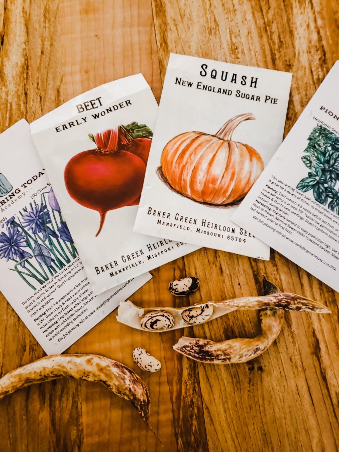 Photo of seed packets on a table.