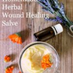 Pinterest pin with two images. Both images are a different angle of wound healing salve in a jar. Text overlay says, "Easy DIY Herbal Wound Healing Salve with Essential Oils".