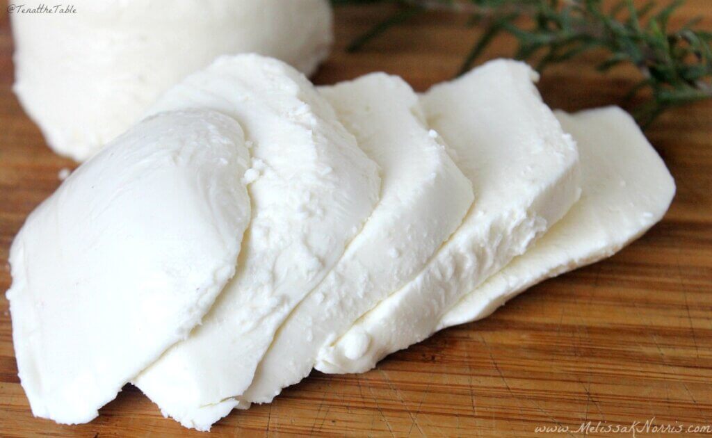 Homemade mozzarella ball sliced.