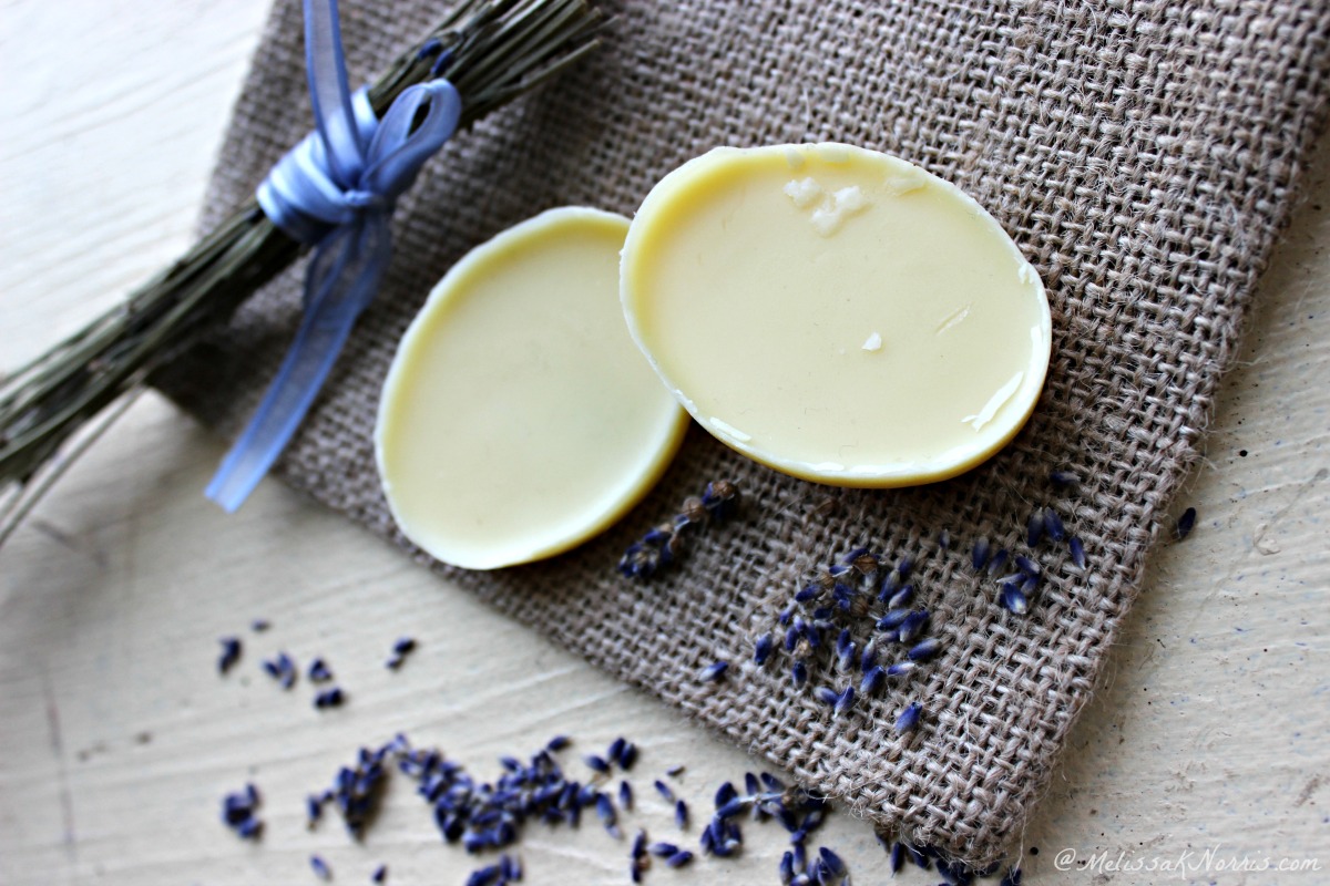 Two lotion bars siting on a table.