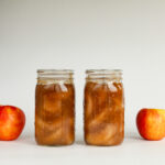 Canned apple pie filling with apples.