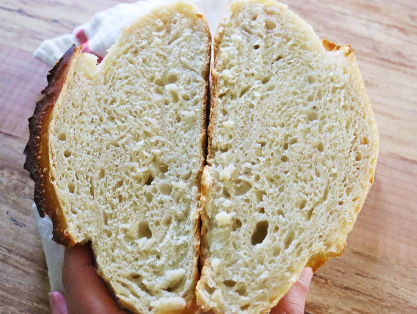 Artisan bread sliced open to reveal the crumb.