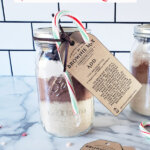 Pinterest pin for DIY Brownie Mix in a mason jar, with photos of brownie mix in a mason jar.