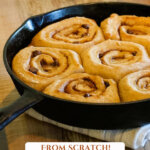 Pinterest pin with an image of chocolate caramel cinnamon rolls in a cast iron skillet.