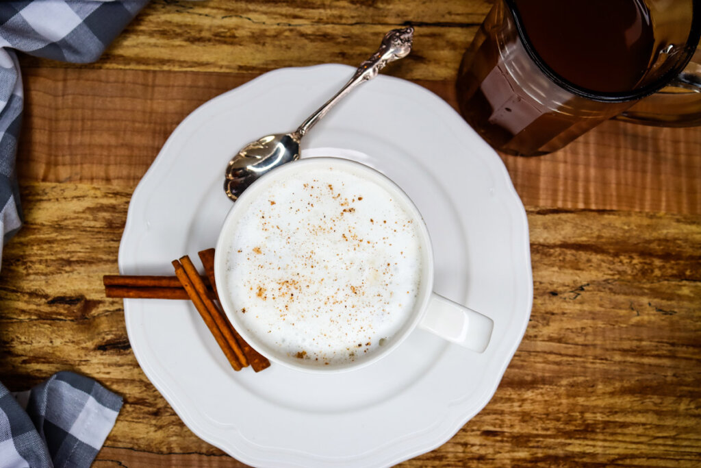 Image of a white cup with a frothy chai tea latte.