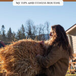 Pinterest pin with an image of a woman lifting a large bale of hay into the back of a truck. Text overlay says, "Fitness for the Homesteading Lifestyle".