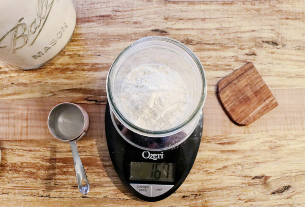 Flour in a bowl on a digital scale.