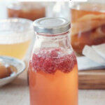 Pinterest pin for healthy ingredient swaps with an image of a bottle of kombucha.