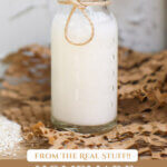 Pinterest pin for how to make cultured buttermilk. Image of buttermilk in a glass jar.