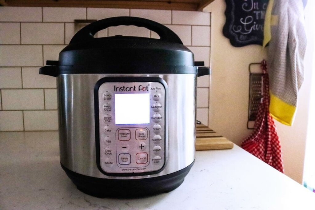 An Instant Pot sitting on the kitchen counter.