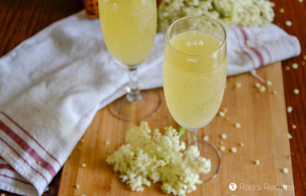 Two glasses of elderflower champagne.