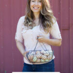 Pinterest pin about homesteading myths. Photos of a woman holding a basket of farm fresh eggs.