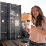 Pinterest pin about homesteading myths. Photos of a woman pointing to a large shipping container.