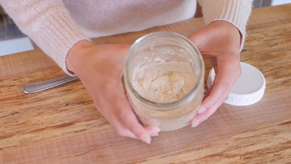 Image of sourdough starter nice and thick in a mason jar.