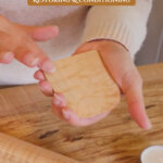 A Pinterest pin for caring for wood products with an image of wooden kitchen utensils and a woman caring for them.