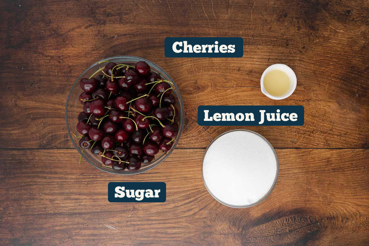 Cherry jam recipe without pectin ingredients: cherries, lemon juice, and sugar.