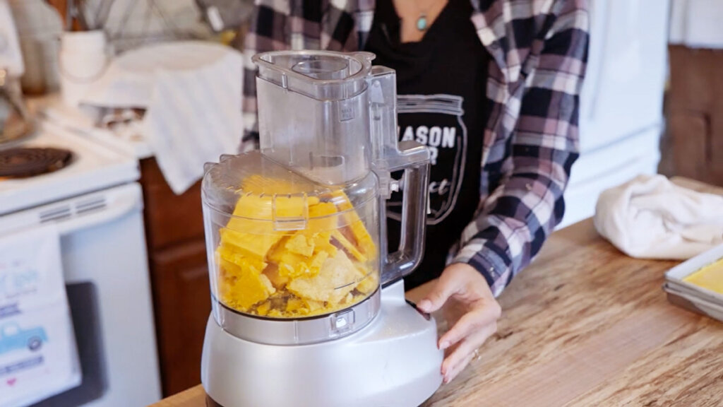 Freeze dried eggs getting pulsed in the food processor.