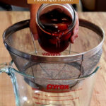 Pinterest Pin for how to make fruit vinegar with an image of fruit vinegar being made.