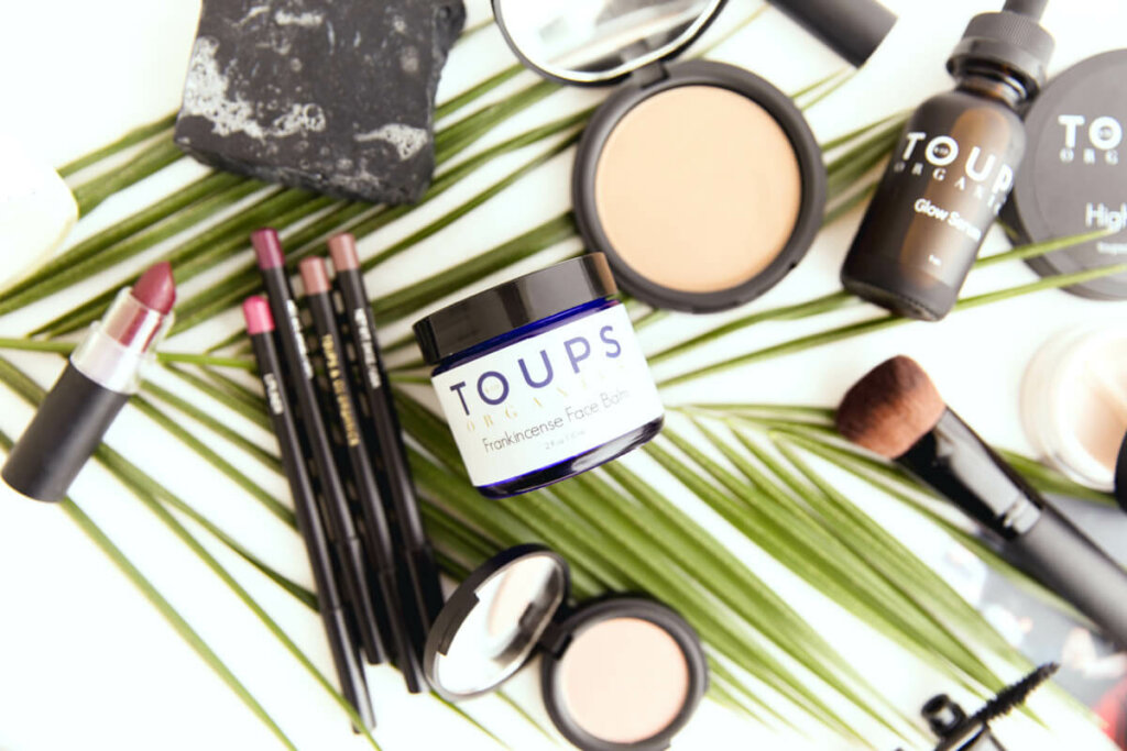 Toups & Co. skincare products laid out on a counter.