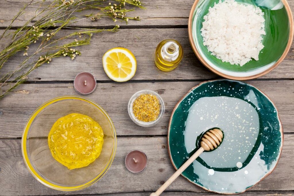 Natural skincare ingredients on a table. Honey, lemon, etc.