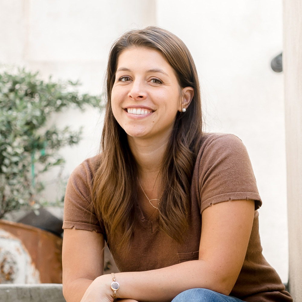 Image of a woman smiling.