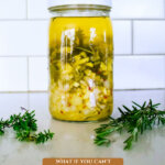 Pinterest pin on alternative medicine with herbs. A photo of a jar of fire cider.