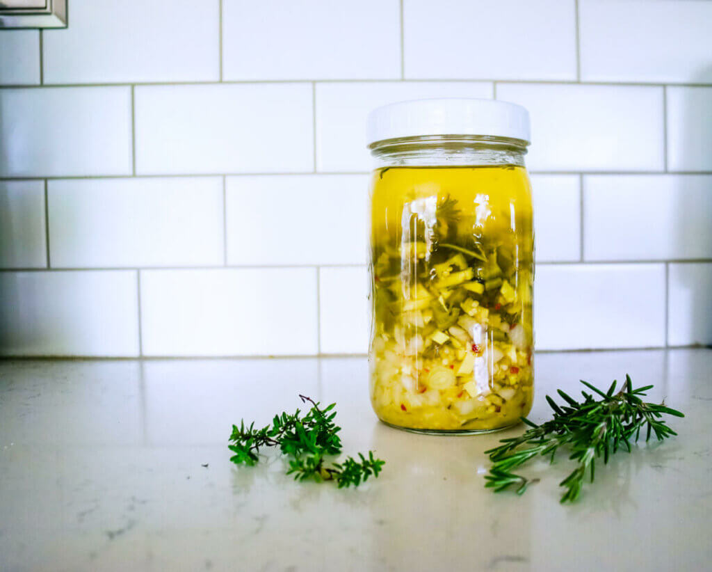 Fire cider steeping in a jar.