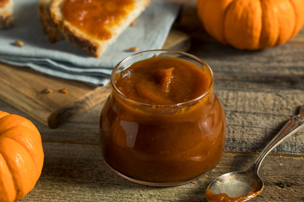 Pumpkin butter in a glass serving jar.