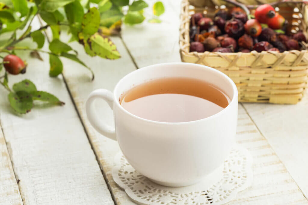 Rosehip tea in a white teacup.