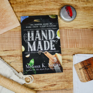 The book Hand Made on a kitchen counter next to other kitchen gadgets.