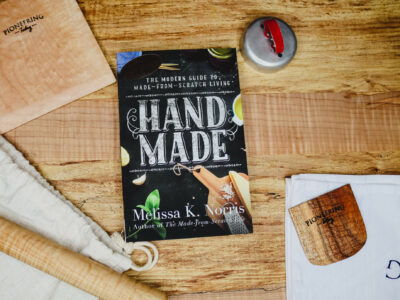 The book Hand Made on a kitchen counter next to other kitchen gadgets.