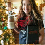 Pinterest pin for how to host a holiday craft party. Image of a woman holding up DIY gifts.