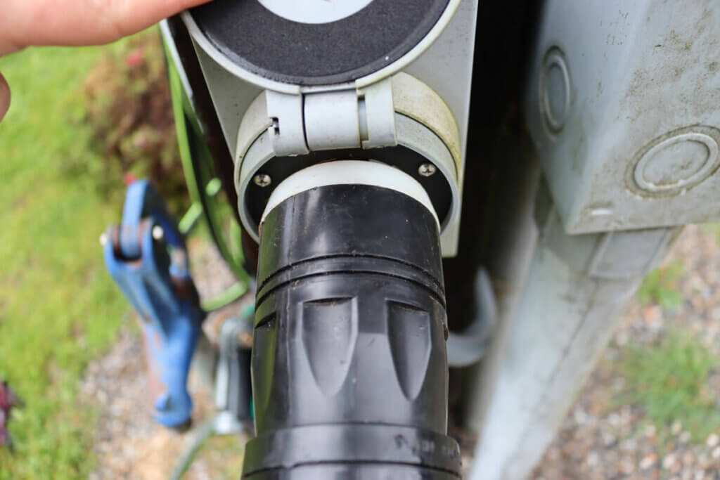 Photo of a power plug going into an electrical box.