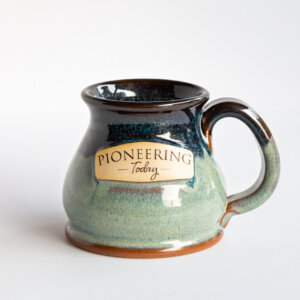 Handmade pottery mug on counter