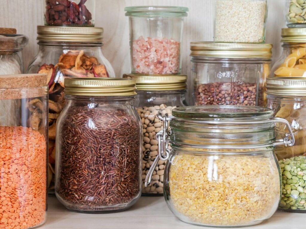 Dry goods in jars for pantry staples. 