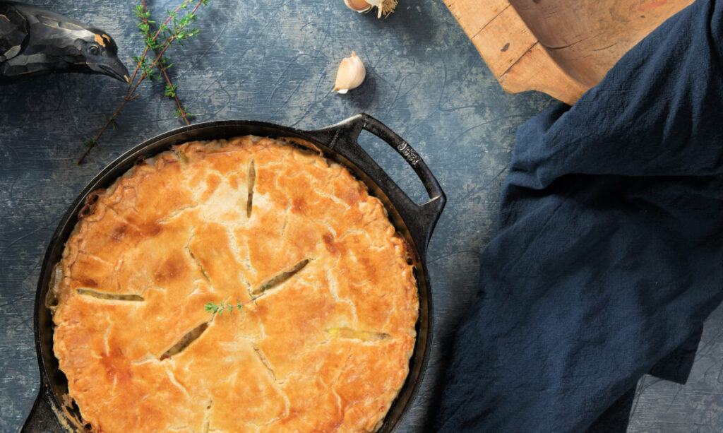 Pot pie in a cast iron skillet.