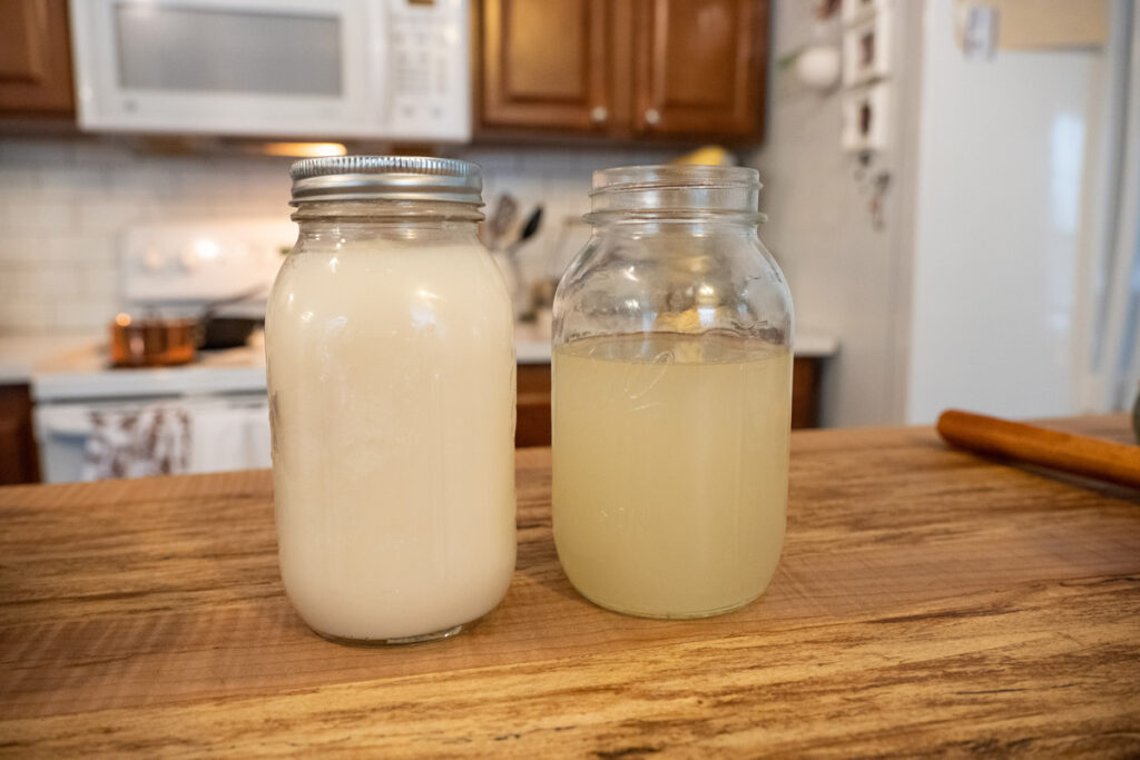 Two jars of lard, one liquid one solid.