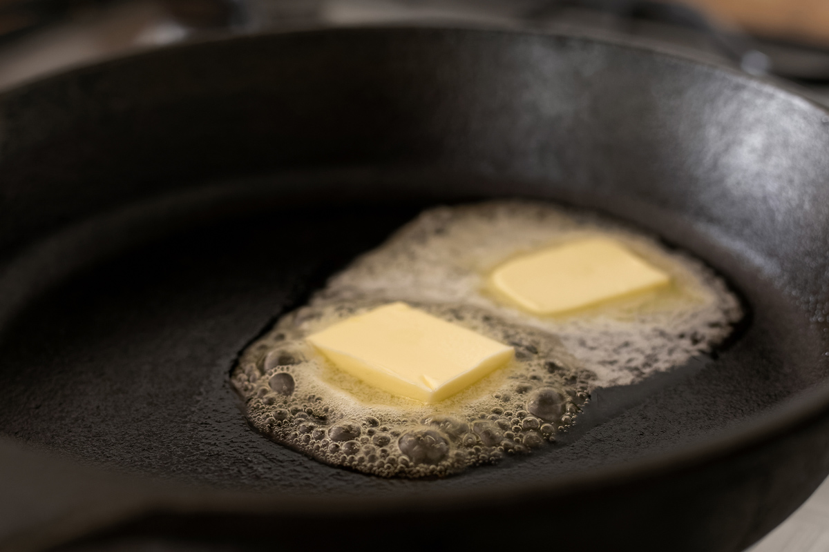 Melting butter in a cast iron pan.