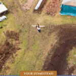 Pinterest pin for preparing your homestead to sell. Image of a vertical view of a large homestead.