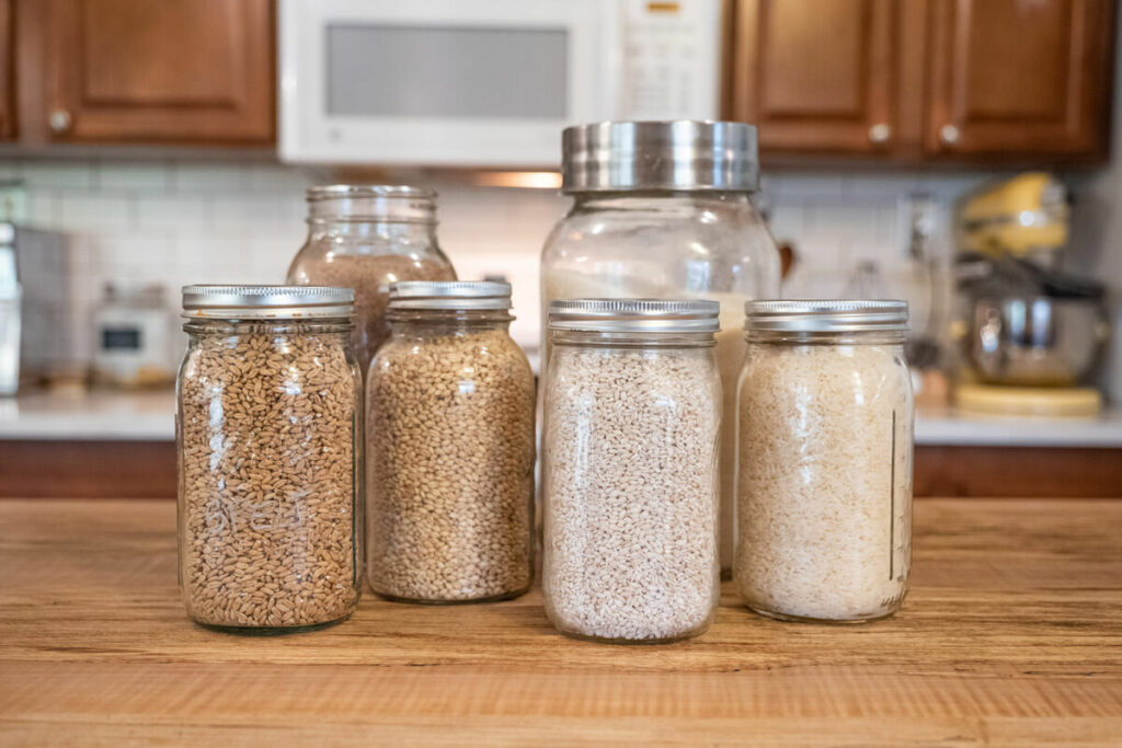 Large jars of dried grains.