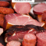 Pinterest pin for how to raise and butcher pigs for the best flavor. Image of cured pork.
